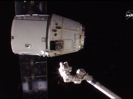 A SpaceX Dragon departing from the ISS