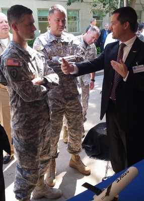 NAWCWD's Mike Murphree explains Spike missile at DoD Lab Day