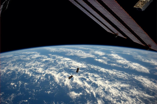 Planet Labs Dove Satellites being deployed from the ISS