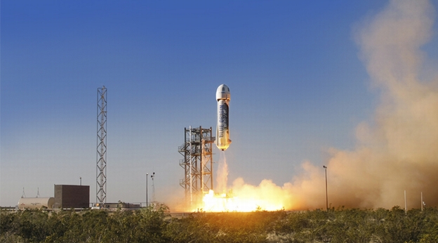 A Blue Origin New Shepard lifting off earlier this year