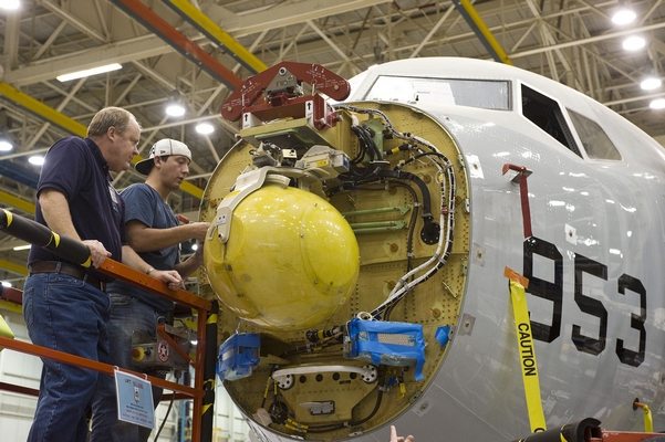 An APY-10 Being Installed in a P-8A's Nose Radome Cavity