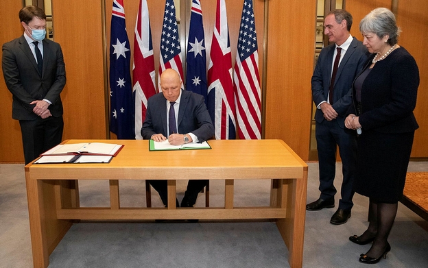 Minister for Defence Dutton signing the Agreement