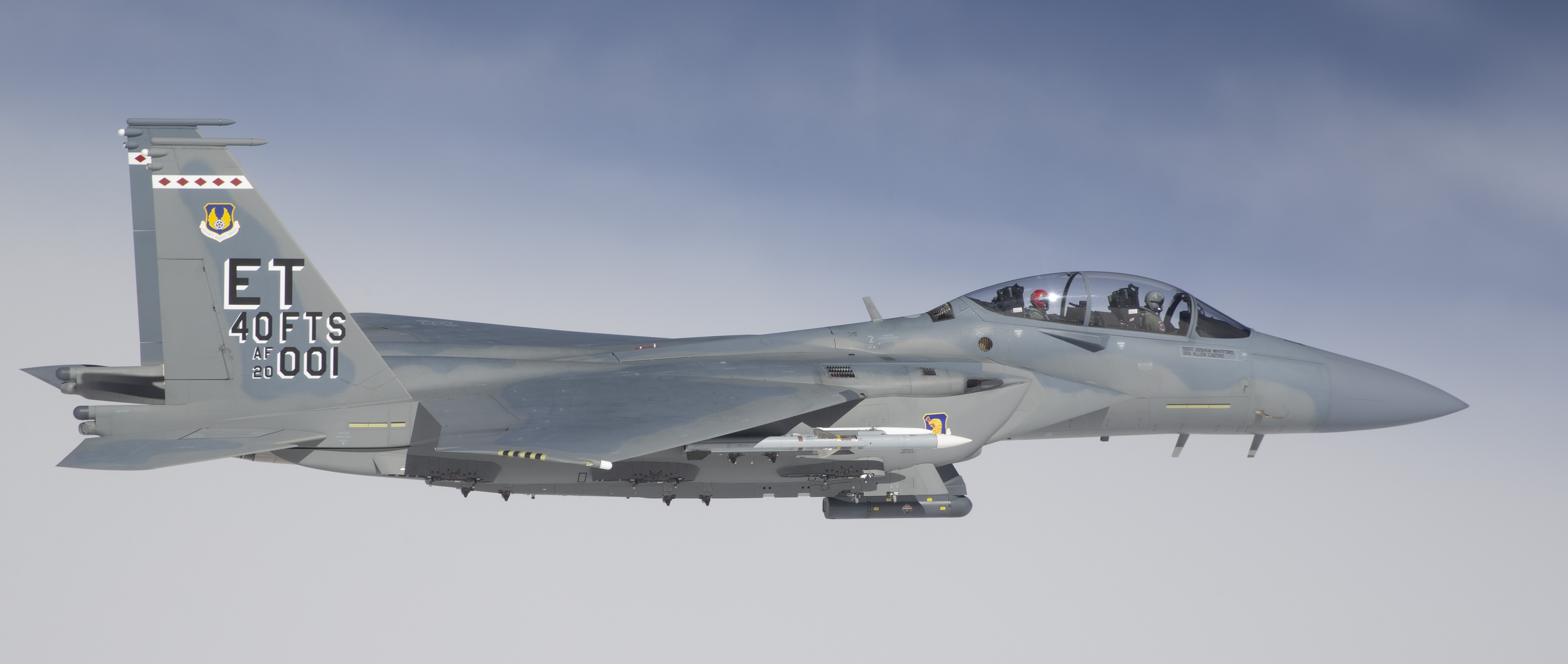 An F-15EX prepares to fire an AIM-120D missile