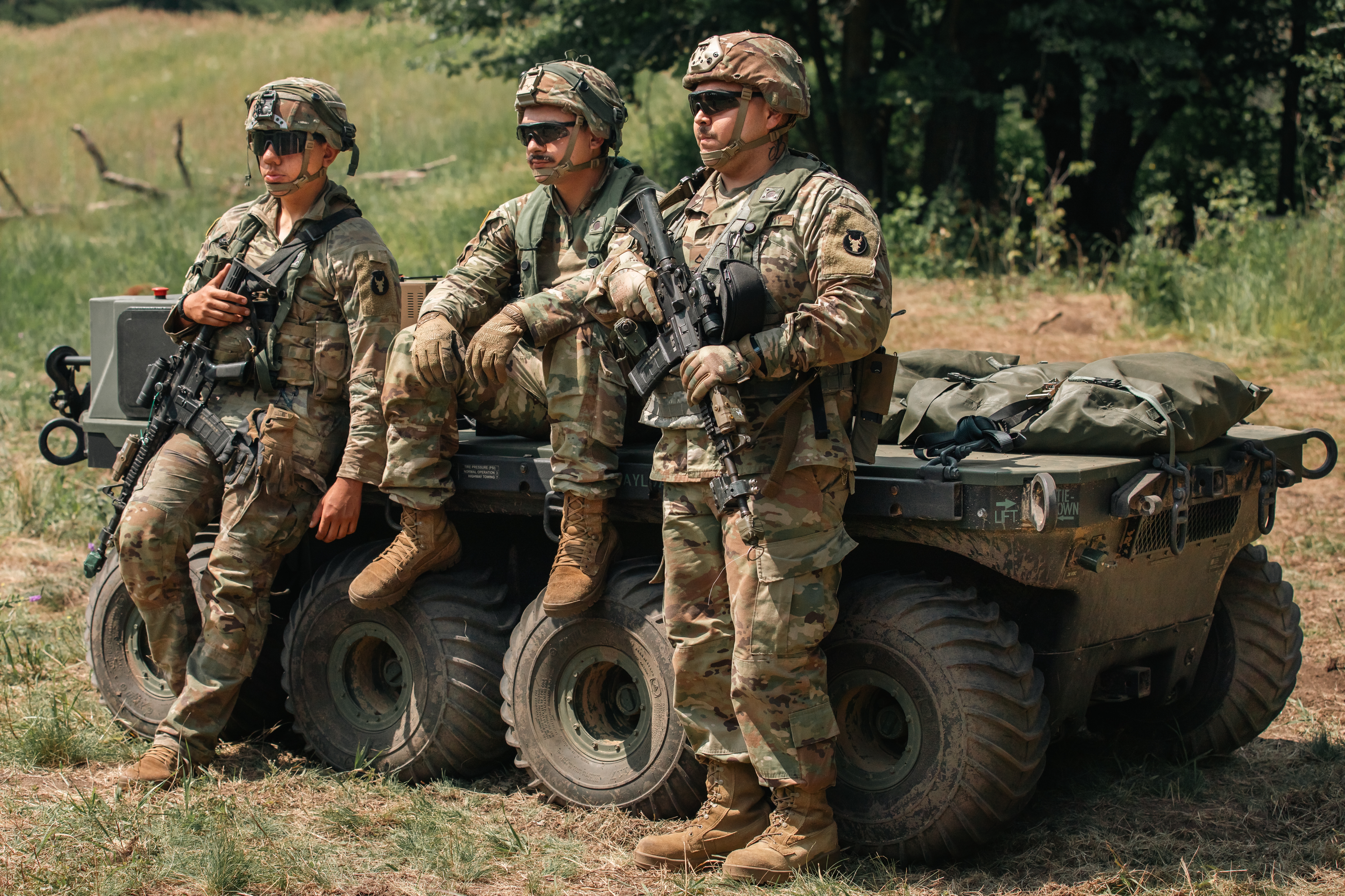 Troops with a Squad Multipurpose Equipment Transport (SMET)