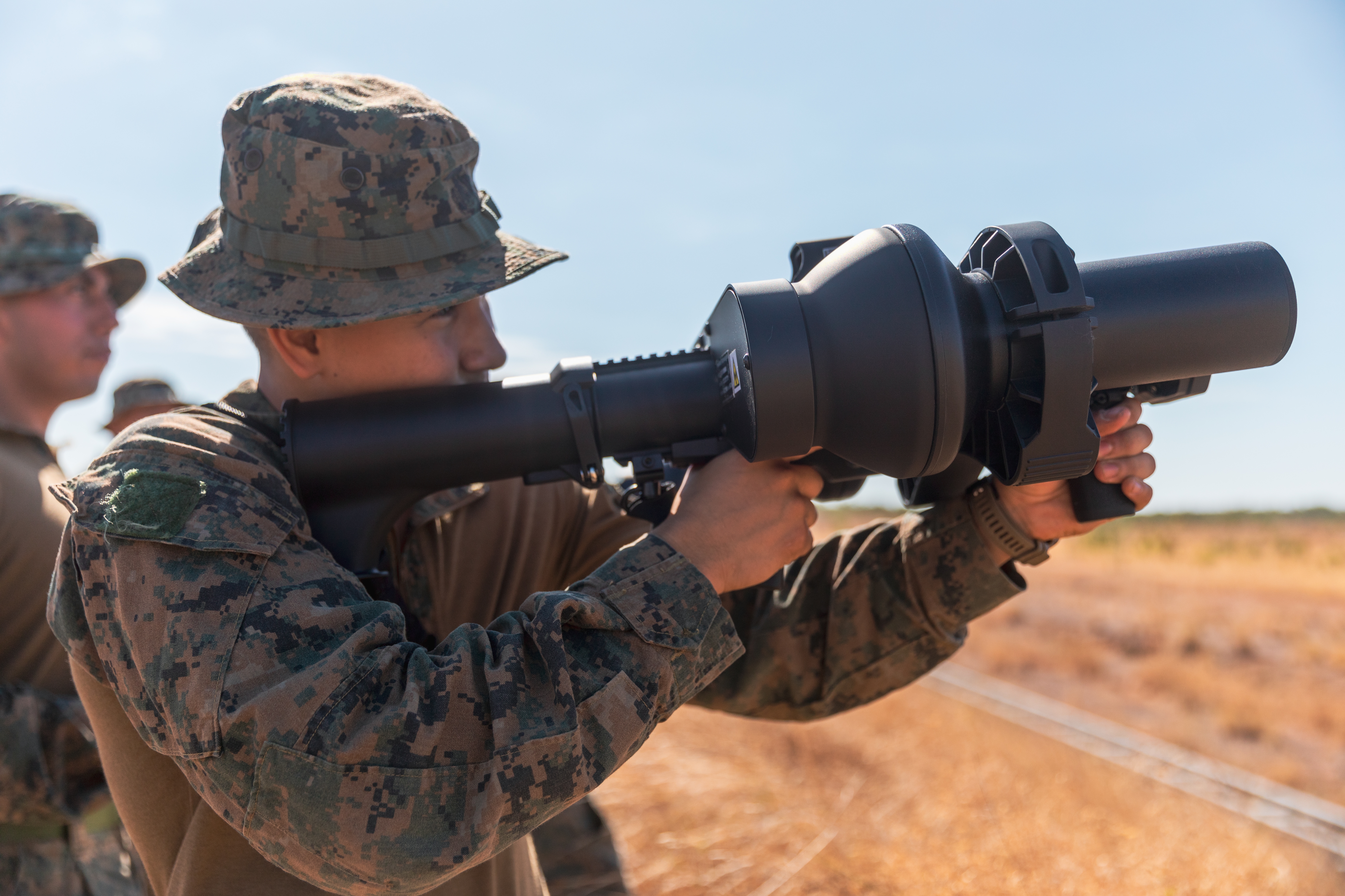 A U.S. Marine operates a C-UAS weapon