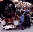 Workers prepare a PWPS turbine for shipment.