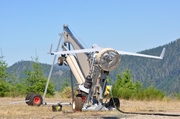 ScanEagle prepares to launch during a wildfire