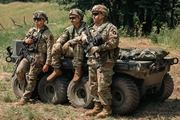 Troops with a Squad Multipurpose Equipment Transport (SMET)