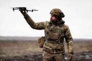 Ukrainian Solider Holds Small Drone