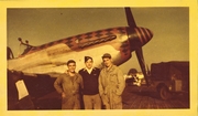 Pilot Ed Nebinger and ground crew alongside a P-51 Mustang